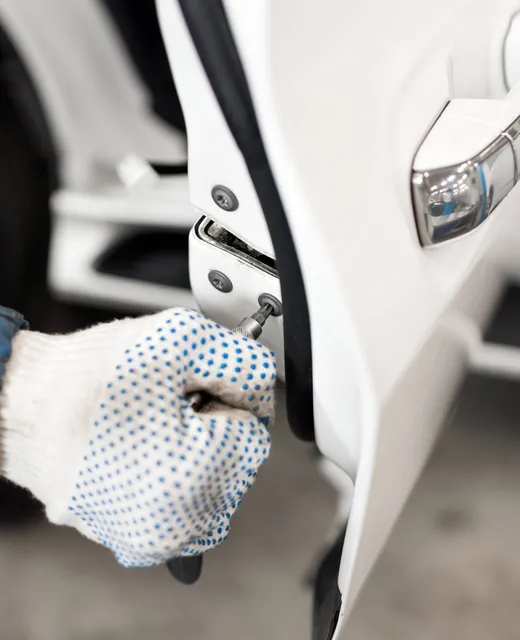Marshall Auto Locksmiths locksmith carrying out car key work